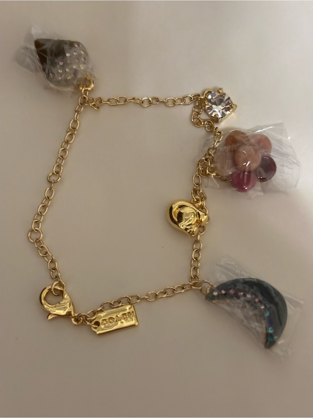 Coach Gold-Tone Charm Bracelet with Multicolor Bead & Crystal Charms